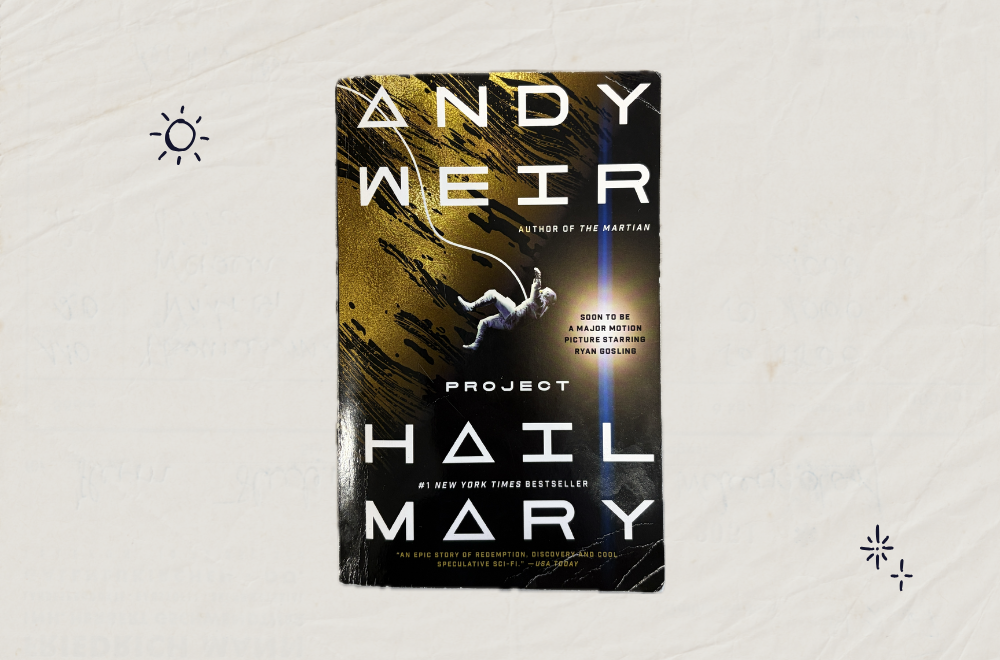 Cover of Project Hail Mary on a crumpled paper background, with drawn stars and a sun